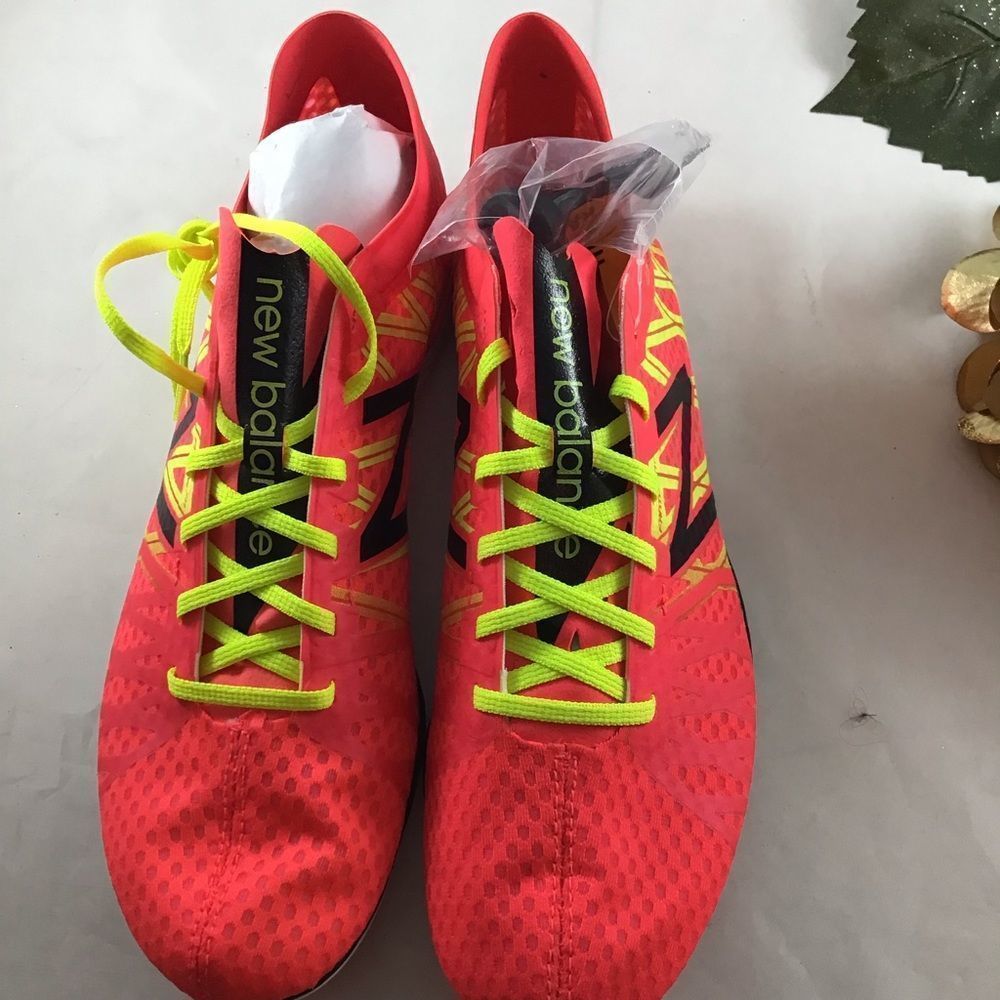New Balance hot pink and yellow bike racing shoes size 11.